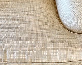 PAIR OF CHAIRS AVAILABLE.                                          Luxury E.J. Victor chair and ottoman upholstered in a pale gold textured fabric. The chair measures 37" x 40" x 36". The ottoman measures 34" x 24" x 17"