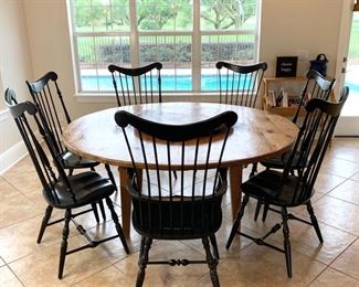 Round waxed pine custom table (with removable lazy- susan) shown with vintage fan-back Windsor chairs.