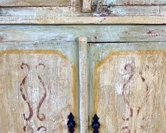 Hand painted distressed 2PC imported cabinet. Bottom piece measures 72" wide and 36.5" high. Top piece measures 69" wide and 51" high. Overall height measures 87.5"