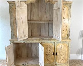 Hand painted distressed 2PC imported cabinet. Bottom piece measures 72" wide and 36.5" high. Top piece measures 69" wide and 51" high. Overall height measures 87.5"
