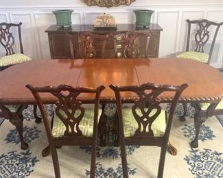 Vintage dining table and 8 chairs. Vintage dining table with double pedestal base has 2 leaves and expands to 10'. The table measures 44" x 72" (no leaves) 96" (with 1 leaf) 120" (with 2 leaves)