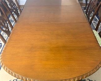 Vintage dining table with double pedestal base has 2 leaves and expands to 10'. The table measures 44" x 72" (no leaves) 96" (with 1 leaf) 120" (with 2 leaves) SHOWN HERE AT 8' WITH 1 LEAF
