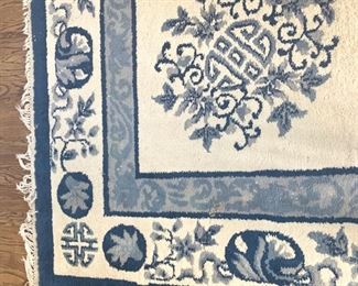 Vintage rug measures 108" x 144"