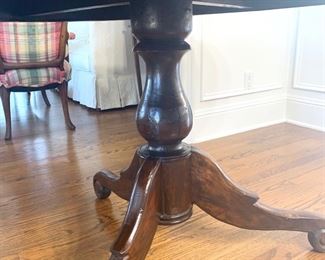 Round pedestal table measures 46" in diameter and 30" high
