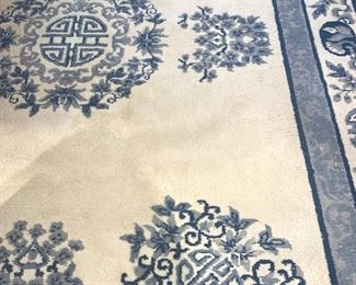 Vintage rug measures 108" x 144"