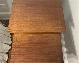 Vintage 2PC nesting table set. The large table measures 19.5" x 16" x 27". The small table measures 16" x 16" x 26"