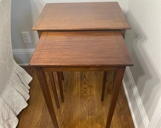 Vintage 2PC nesting table set. The large table measures 19.5" x 16" x 27". The small table measures 16" x 16" x 26"