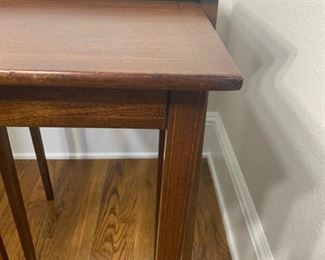 Vintage 2PC nesting table set. The large table measures 19.5" x 16" x 27". The small table measures 16" x 16" x 26"