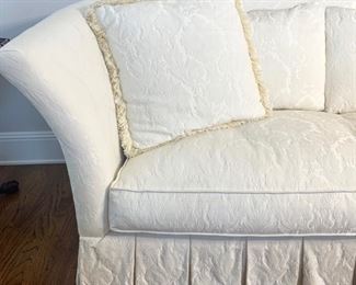 White damask sofa/loveseat  measures 75" long and 37" deep