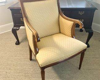 Gold upholstered wood arm chair measures 26" x 26" x 38"