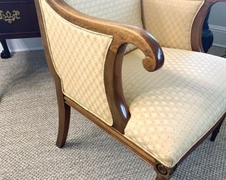 Gold upholstered wood arm chair measures 26" x 26" x 38"