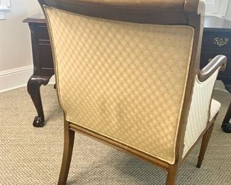Gold upholstered wood arm chair measures 26" x 26" x 38"