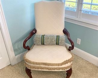 Arm chair with fringe detail measures 26" x 25" x 42" (some stains on seat of chair)