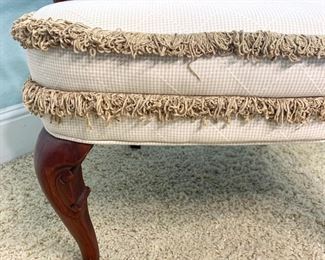 Arm chair with fringe detail measures 26" x 25" x 42" (some stains on seat of chair)