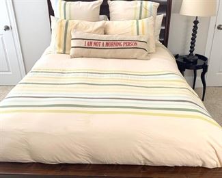 American Signature espresso queen bed frame with available matching dresser.