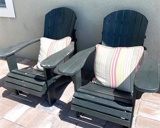 Green distressed adirondack chairs
