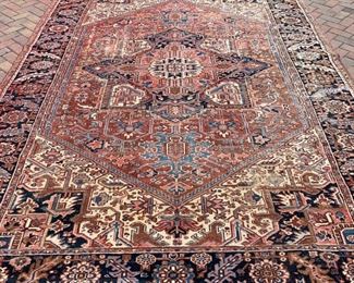 Vintage rug measures 106" x 144"