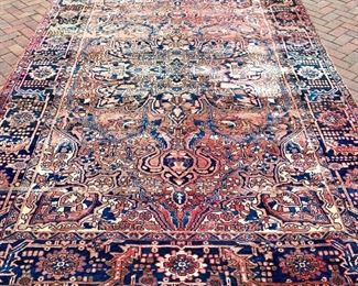 Vintage rug measures 96" x 136"