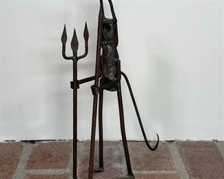 OUTSIDER ART METAL DEVIL FIGURE | grasping a pitchfork in one hand and a spike in the other; h. 9-1/2 in. 