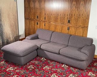 PREVIEW FURNITURE SOFA & OTTOMAN | including a three cushion sofa and matching ottoman, upholstered in an aubergine and grey patterned wool; h. 29 x 86 x 37 in. (sofa); h. 18 x 32 x 32 in (ottoman); excellent condition 