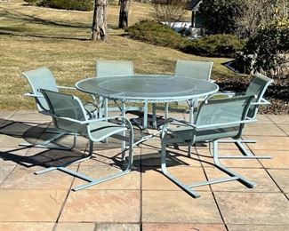 BROWN JORDAN PATIO TABLE & CHAIRS | including a large round table with trellis frame (h. 29 x dia. 61 in.), plus six armchairs (h. 31 x 24-1/2 x 29 in.); stored indoors during winter in a storage room  