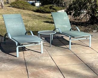 (3pc) BROWN JORDAN PATIO FURNITURE | powdercoated teal with mesh seats, including a pair of lounge chairs (h. 35 x 72 x 27 in.) and a matching low table (h. 15 x dia. 21 in.) 