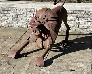 OUTSIDER ART METAL LION SCULPTURE | sheet metal and welded pipe and tubing, signed with welded conjoined initials on back; h. 31 x 23 x 41 in. 