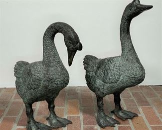 PAIR CHASED METAL DUCKS | one preening, the other with head raised; tallest h. 20 in. 