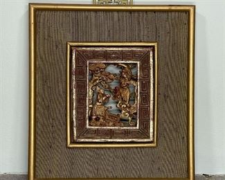 GILT CARVED CHINESE PANEL | showing two figures in an openwork scene, one dancing on clouds; 9-1/2 x 8 in. 