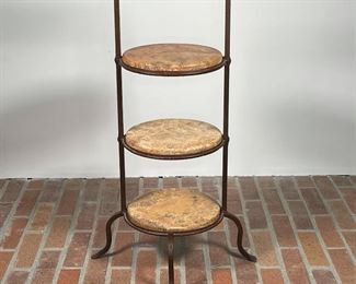 WROUGHT IRON & STONE STAND | substantial weight, painted wrought iron with three tiers of circular inset stone; h. 31 x 18 x 19 in. 