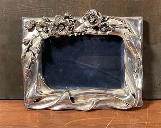 SILVER REPOUSSE PICTURE FRAME | marked "925 sterling"; 8-1/4 x 6-1/4 in. 