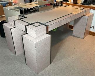 CHROME INLAY 1980'S DESK | with three hidden-front drawers and a chrome mounted document organizer; h. 34 x 76 x 39 in. 