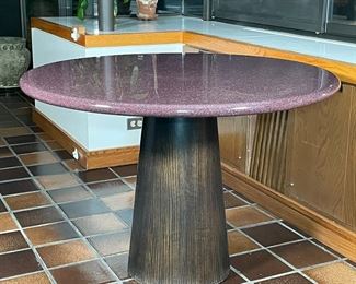 CONTEMPORARY PEDESTAL TABLE | patterned composit top on a tapering dark wood veneered pedestal; h. 29 x dia. 42 in. 