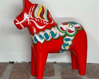 NILS OLSSON PAINTED CARVED HORSE | orange with hand paint, label on bottom; h. 9 in.