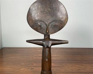 ETHNOGRAPHIC CARVED FIGURE | carved wooden female figure with arms outstretched; h. 15 in. 