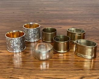 GROUP MISC. NAPKIN RINGS | including two repousse design, plus brass, etc. 