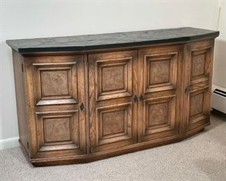 AMERICAN of MARTINSVILL SIDE CABINET | one inch thick slate top over four paneled cabinet doors, center doors with fitted drawers, outside doors with shelves; h. 29 x 56 x 18 in.; missing one pull marks from loose pulls, otherwise in excellent condition