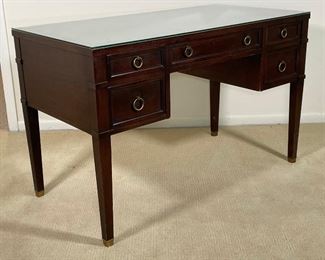 MILLING ROAD / BAKER WRITING DESK | directoire style, tooled leather top (protected by glass) five drawers on straight tapering legs; h. 29 x 49 x 23 in.