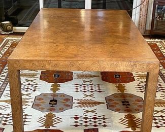 MID CENTURY BURL DINING TABLE | interesting extension mechanism; h. 29 x 73 x 45 in.; two leaves each 24 in, legs a bit wobbly could be tightened