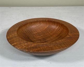 JERRY DAVIS TURNED WOOD BOWL | highly figured wood turned low bowl, signed "Catalpa, 1991 / Jerry Davis"; h. 3 x dia. 11-1/2 in.