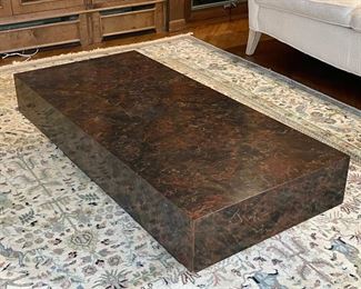 CONTEMPORARY LOW TABLE | marbled laminate top and sides "floating" over a black base; h.13 x 52 x 24 in.