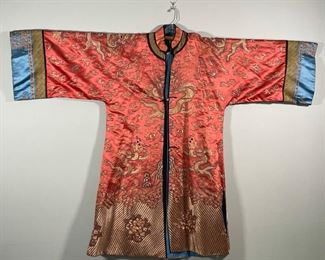 FINELY EMBROIDERED CHINESE ROBE | with a sinous dragon among clouds in gold thread; length (collar to seam) 48 in. width (from cuff to cuff) 65 in.; minor separation at collar