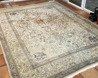 KIRMAN STYLE CARPET | with deer, birds, and flowers among vines, cream ground; 11ft-6in x 8ft-2in.; some wear