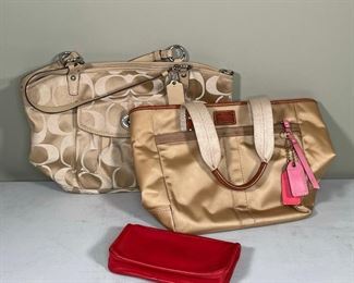 (3pc) COACH BAGS | including a gold purse with C logos (10 x 16 in.), a gold purse with pink canvas straps, and a leather pencil case