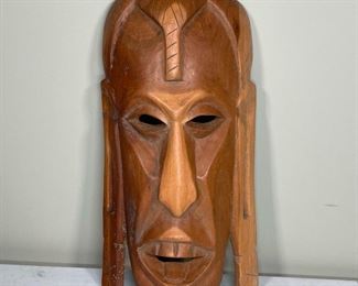 KENYAN CARVED MASK | marked "made in Kenya"; h. 12 in.