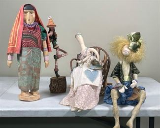 (4pc) MISC DOLL FIGURES | including a woman in a chair, "Mother Little Helper" by Charlie Patricolo, a wire dancer doll figure, (h. 15 in.) and a standing carved wood figure of a woman