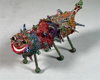 ART PAINTED FIGURE | speckled paint decorated figure on six legs; 4 x 9 in.