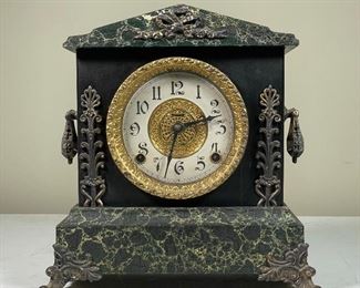 HARVARD FAUX STONE MANTEL CLOCK | having a faux stone on a black painted frame with metallic mounts, Arabic numeral markers, original paper label; 11-1/2 x 11 x 6 in.