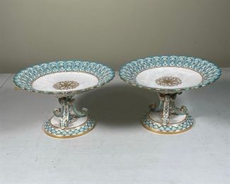 PAIR GILT PORCELAIN TUREENS | gilt decorated with openwork rims, raised on scrollwork tripod supports; h. 6 x dia. 10 in.; one with loose top
