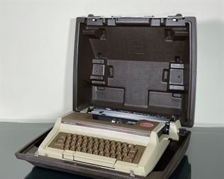 SMITH CORONA ENTERPRISE II TYPEWRITER | in brown travel case, handle missing; not tested